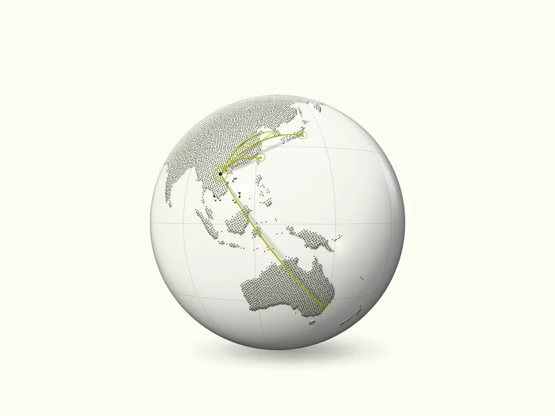 Địa cầu gốm trắng nghiêng về phía nam, cung vàng chanh dài từ Sydney băng qua quần đảo Indonesia và cung ngắn từ Đài Bắc cùng về Vinh